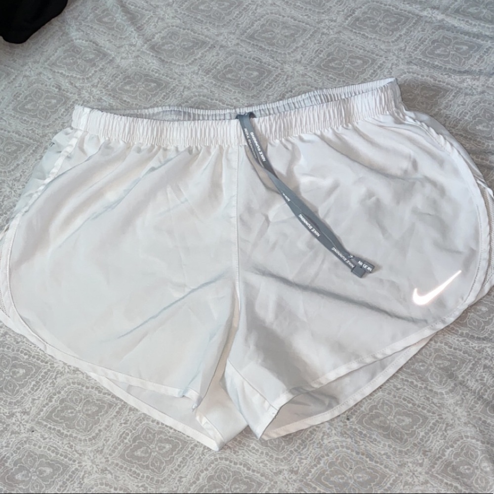 white nike running shorts🤍
